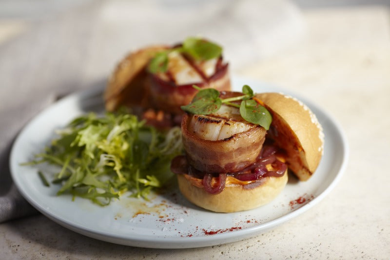 Bacon wrapped Scallop Sliders on plate